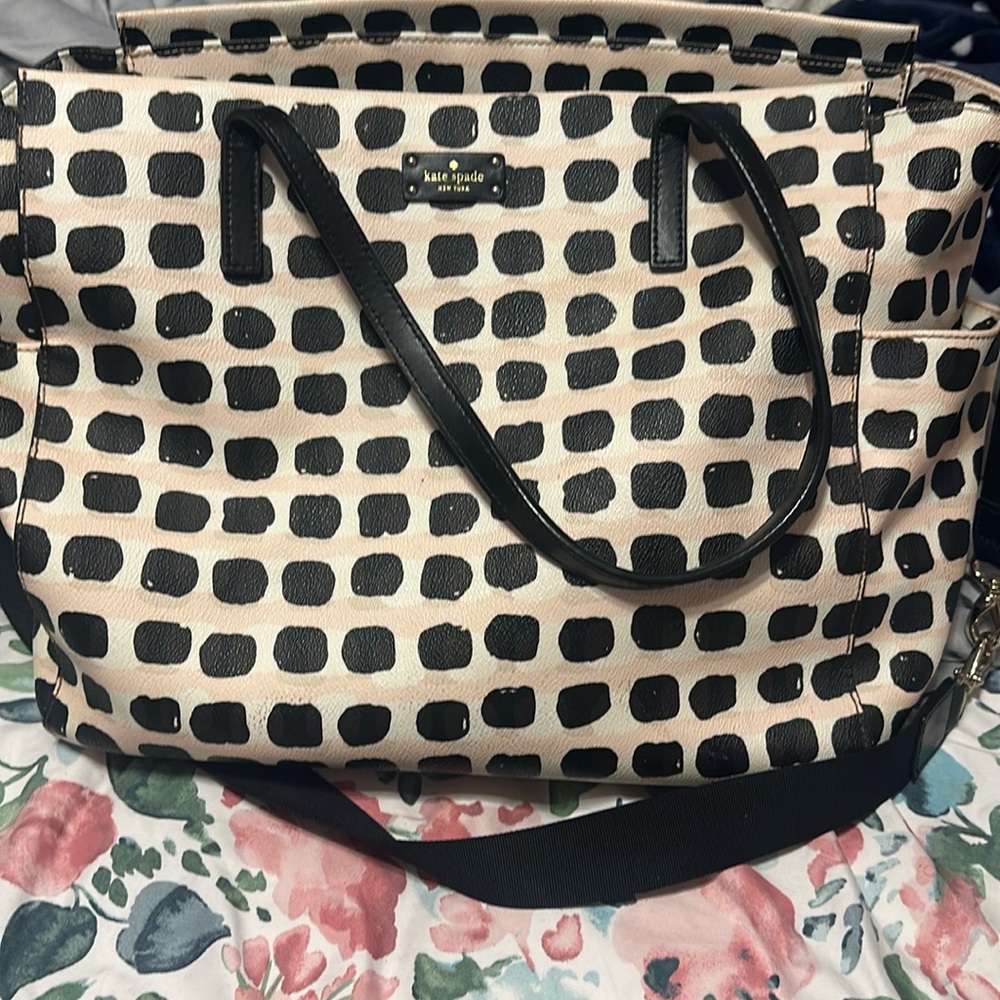 Barley used Kate Spade diaper bag in excellent condition, will need a zipper.